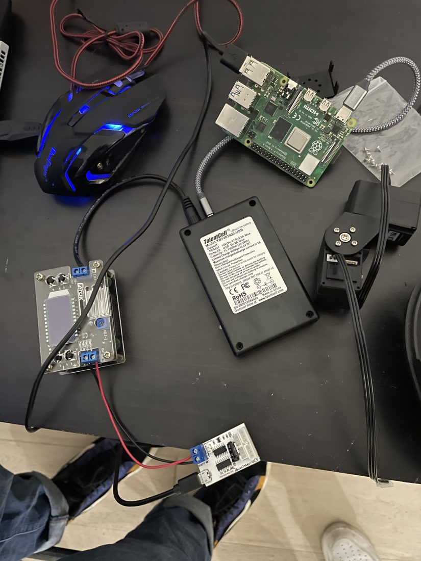 Raspberry Pi and drive electronics laid out on the bench