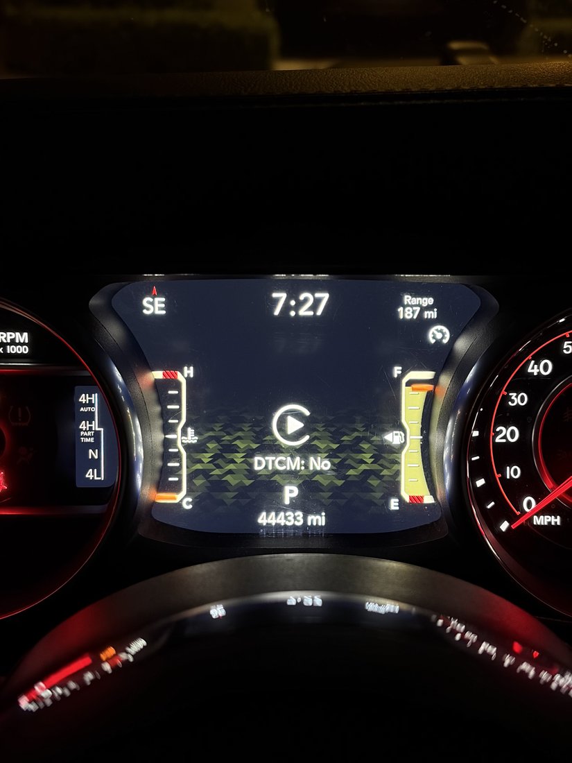 Instrument cluster showing DTCM disabled and no active 4WD mode