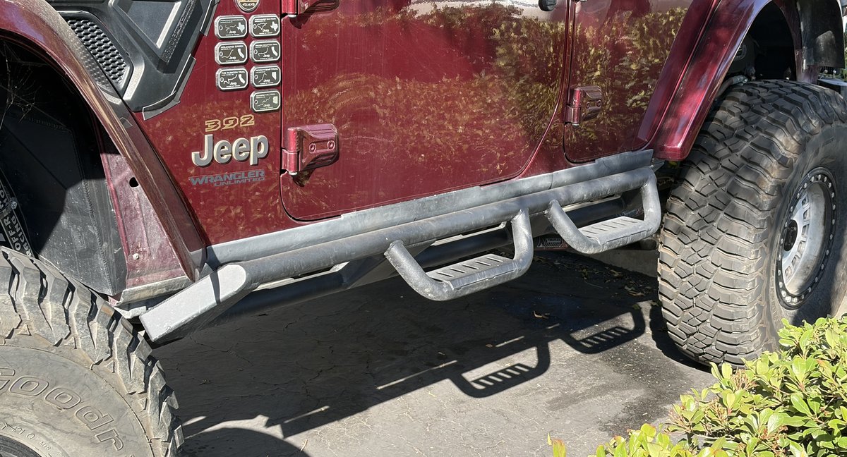 The finished step installed on the Jeep